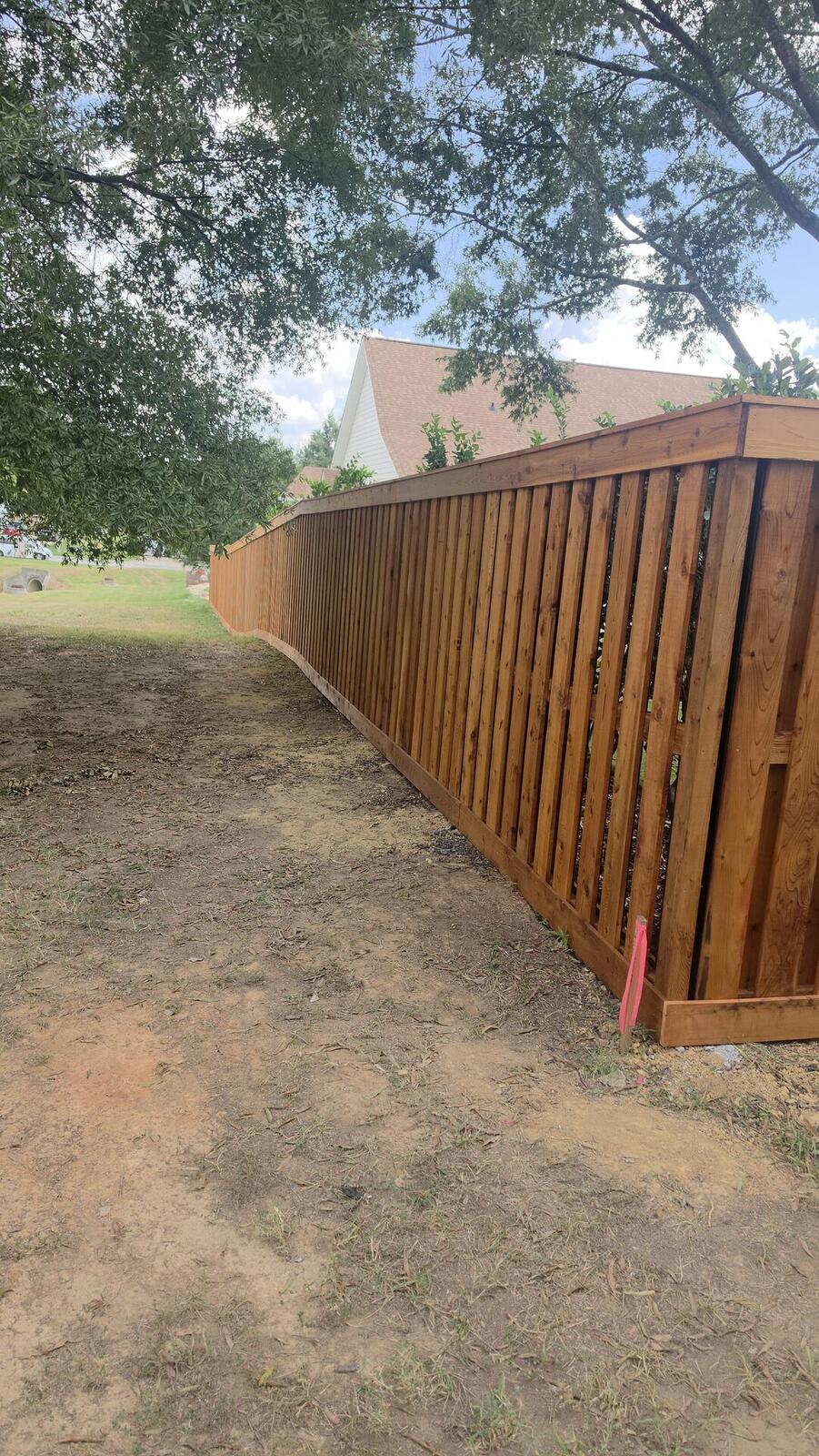 Long Western red cedar shadowbox privacy fence run Monroe NC
